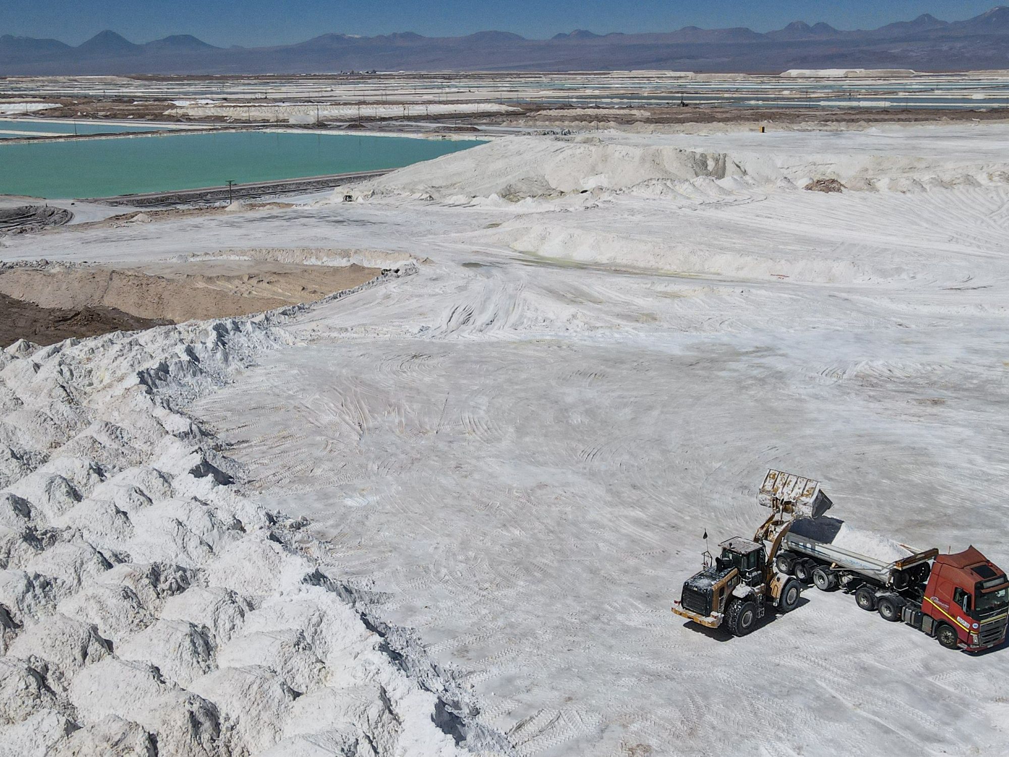 A lithium mine and vehicles seen from above