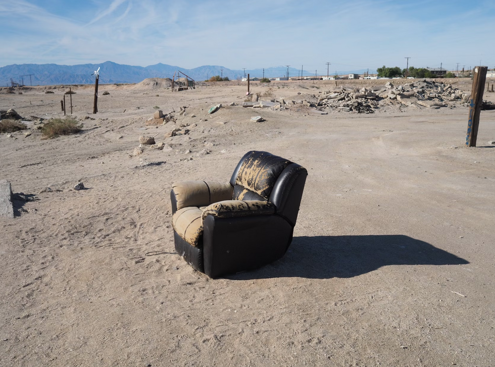 A lone chair along the beach of the Salton Sea, in Southern California.