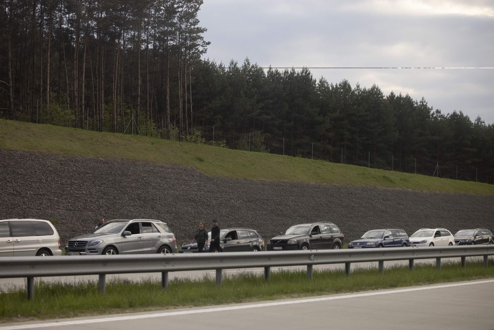 A long queue of vehicles with Ukrainian civilians seen at the Polish border to enter Ukraine