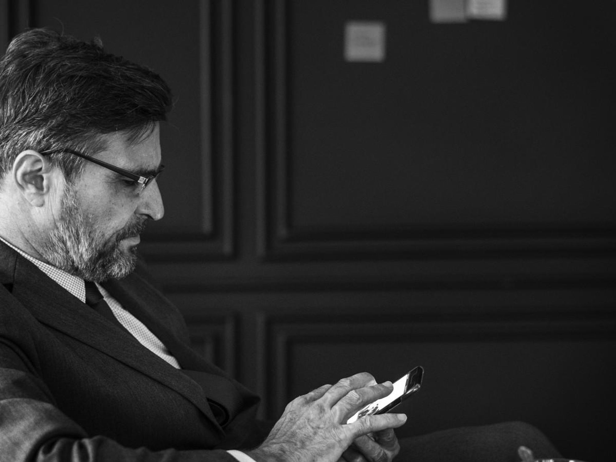 a man checking his phone