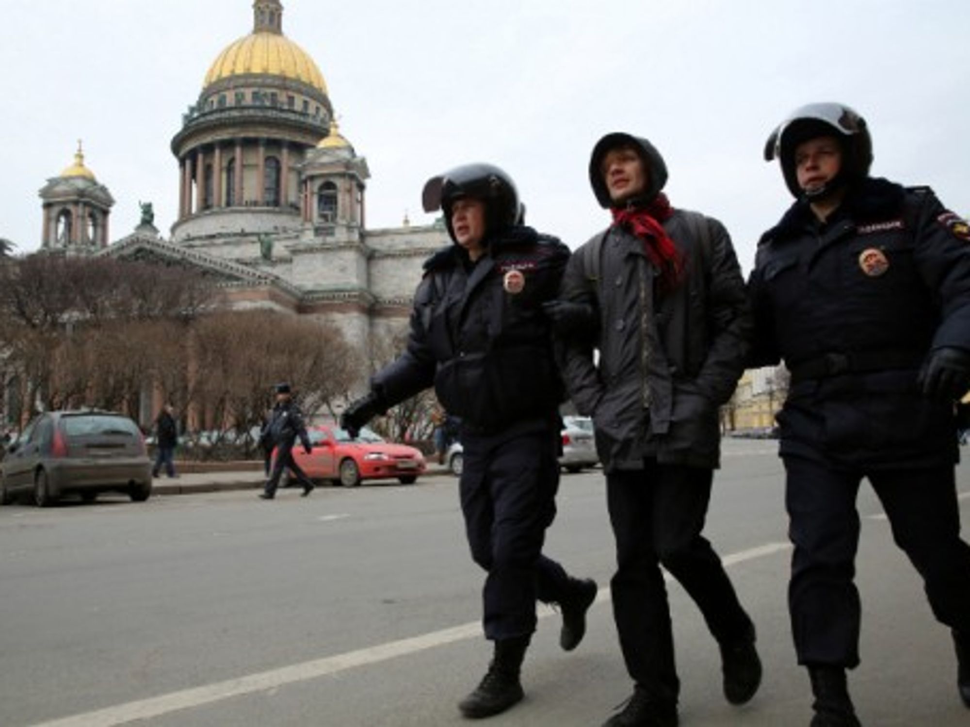 A man protests in St. Petersburg against the introduction of Russian troops in Ukraine, in March 2014.
