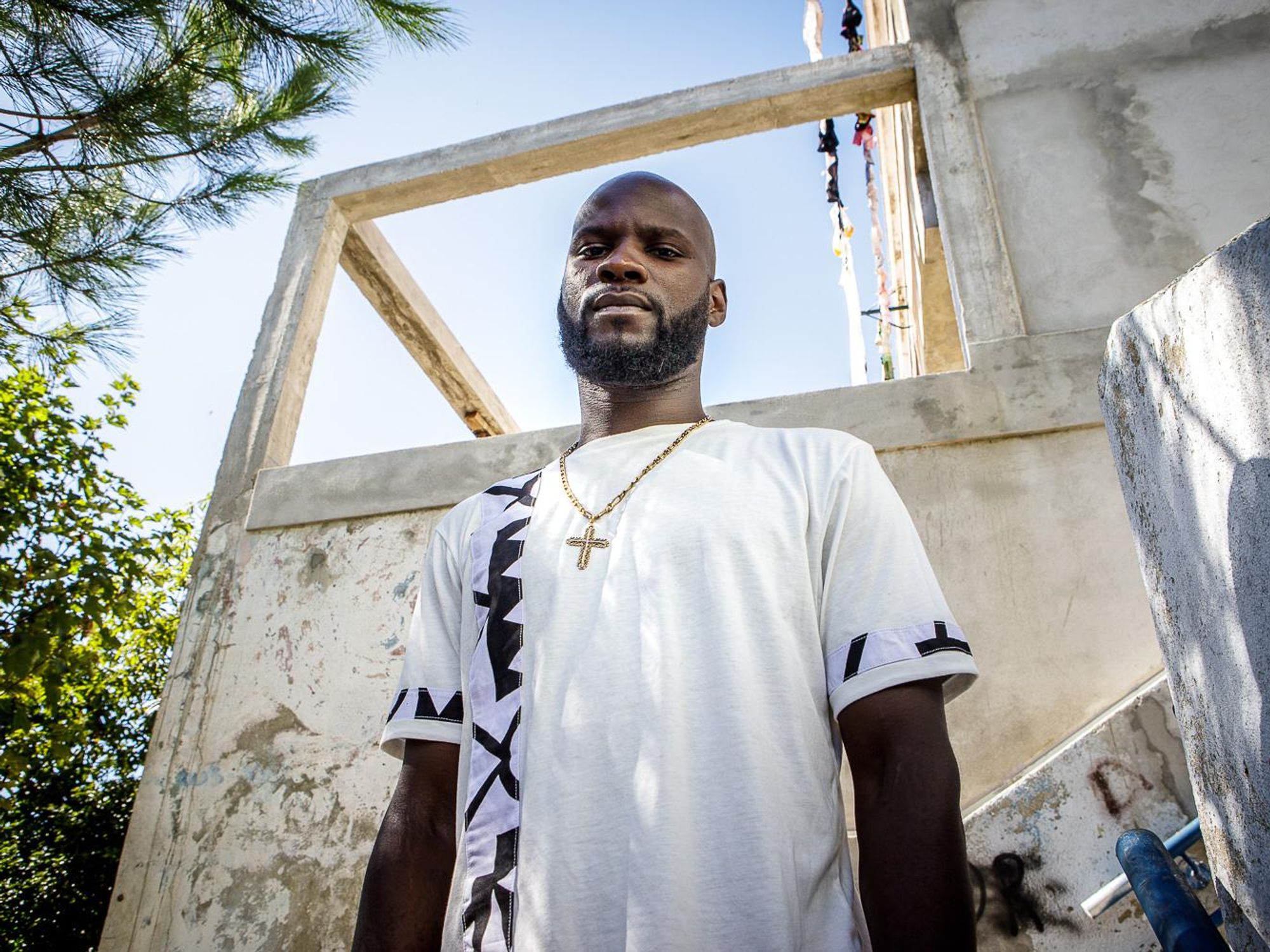 a man standing in front of a building