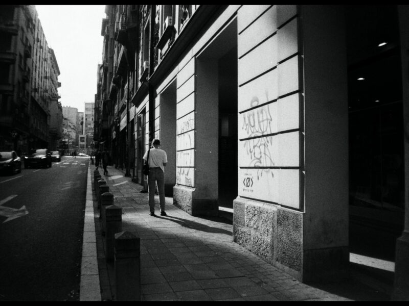 A man walks on the sidewalks in Belgrade, Serbia