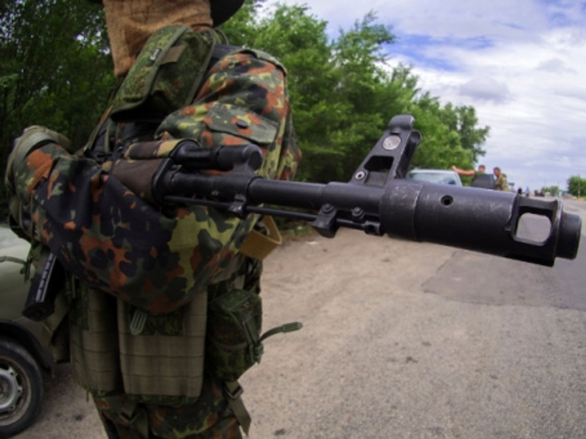 A masked pro-Russian rebel in Ukraine last year