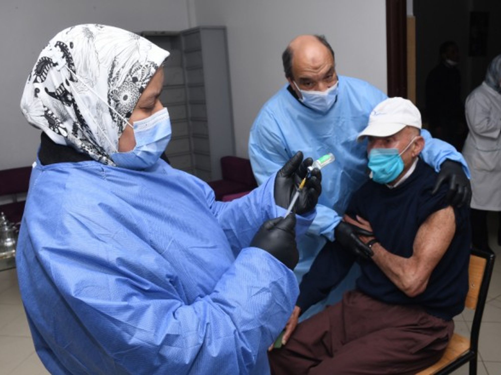 A medical worker prepares a dose of COVID-19 vaccine in Rabat, Morocco