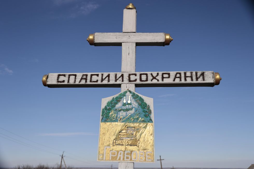 A memorial cross at the crash site of Malaysia Airlines Flight MH17 near the village of Grabovo.