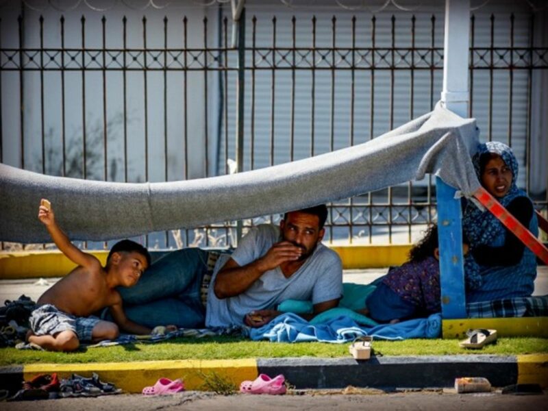 A migrant family left without shelter on the Greek island of Lesbos