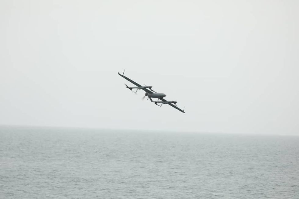 A military unmanned aerial vehicle (UAV or drone) launched from an Iranian navy vessel in the Indian ocean