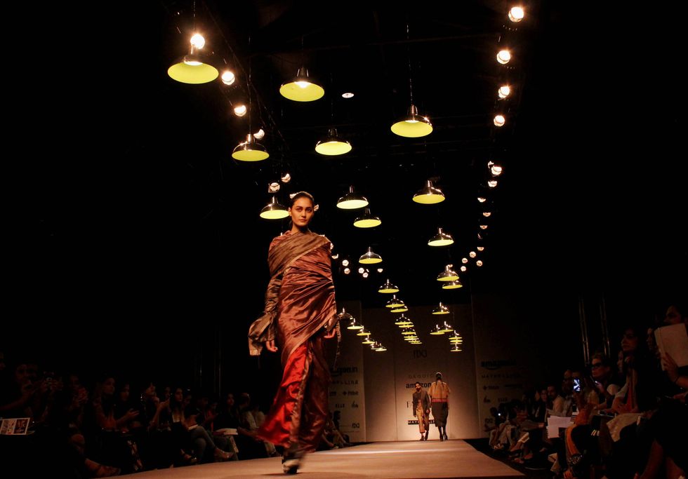A model presents a creation by Indian fashion designer Akaaro by Gaurav Jai Gupta .