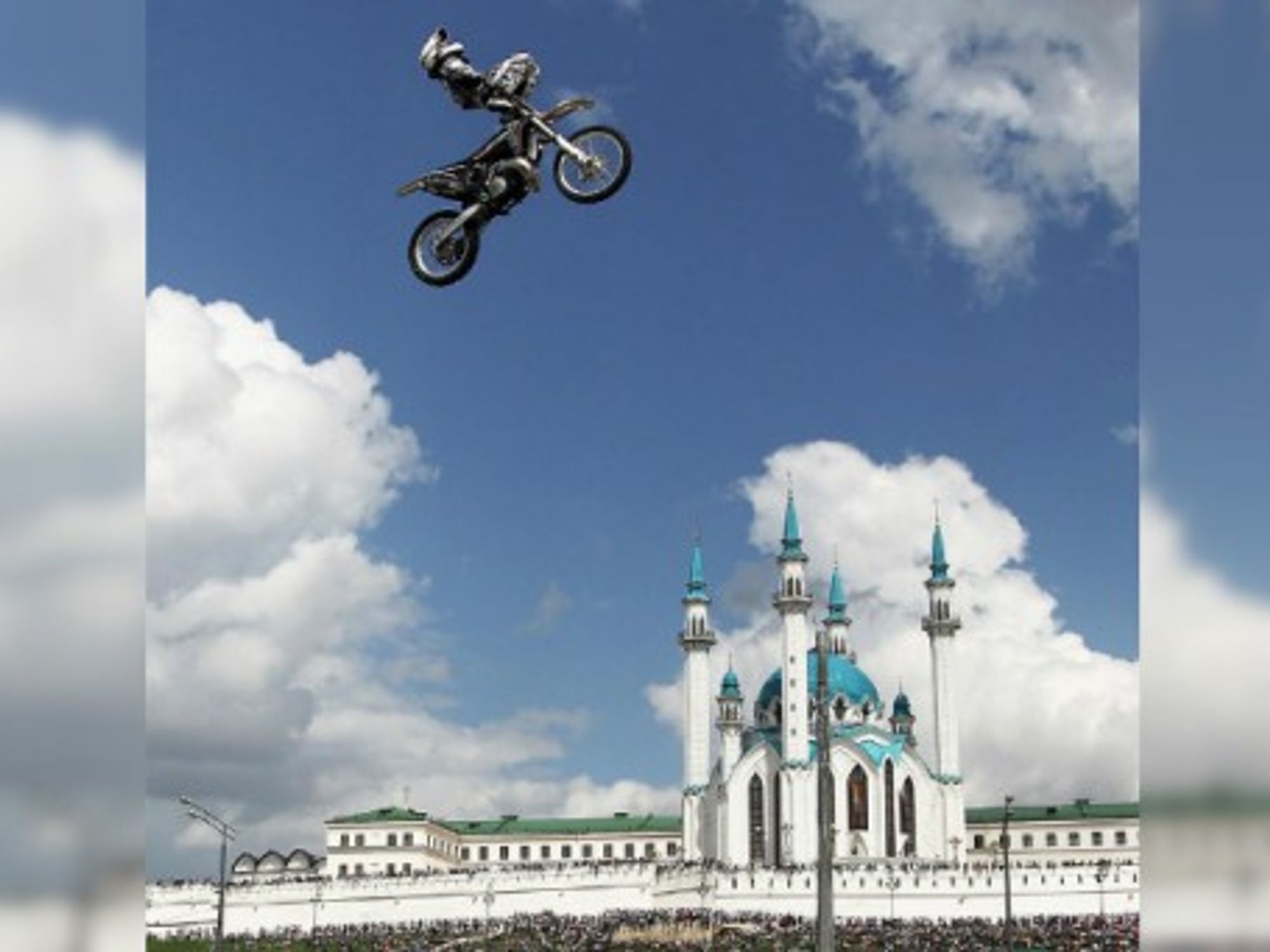 A motorcycle rider soars at the 2014 Kazan City Racing show in Millenium Square in Kazan, Tatarstan.