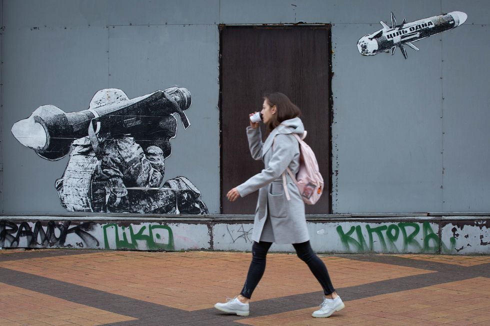A mural depicting a Ukrainian soldier central Kyiv