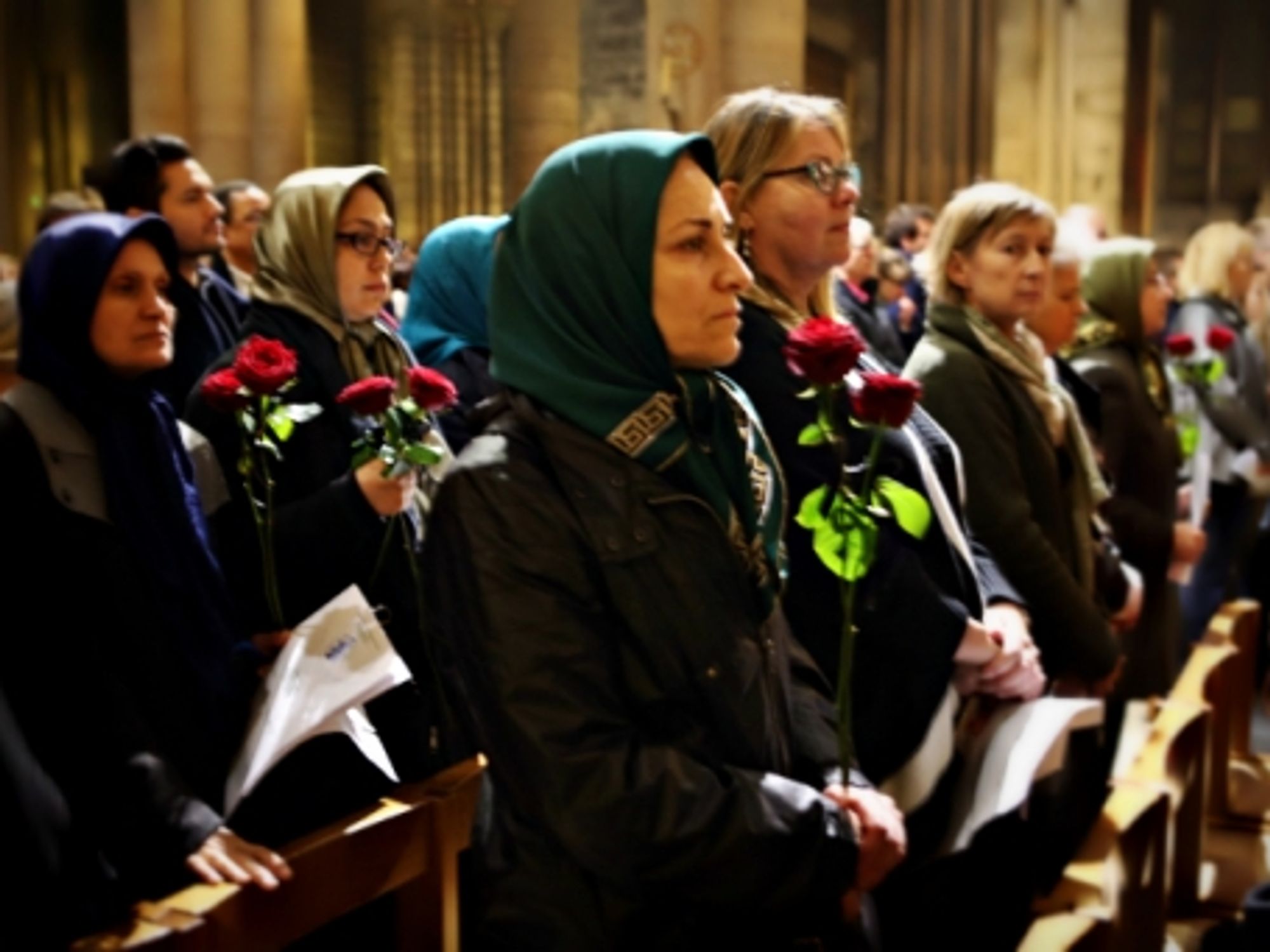 A Muslim women in the Notre Dame cathedral during a memorial service for the victims of the Paris attacks on Nov. 15