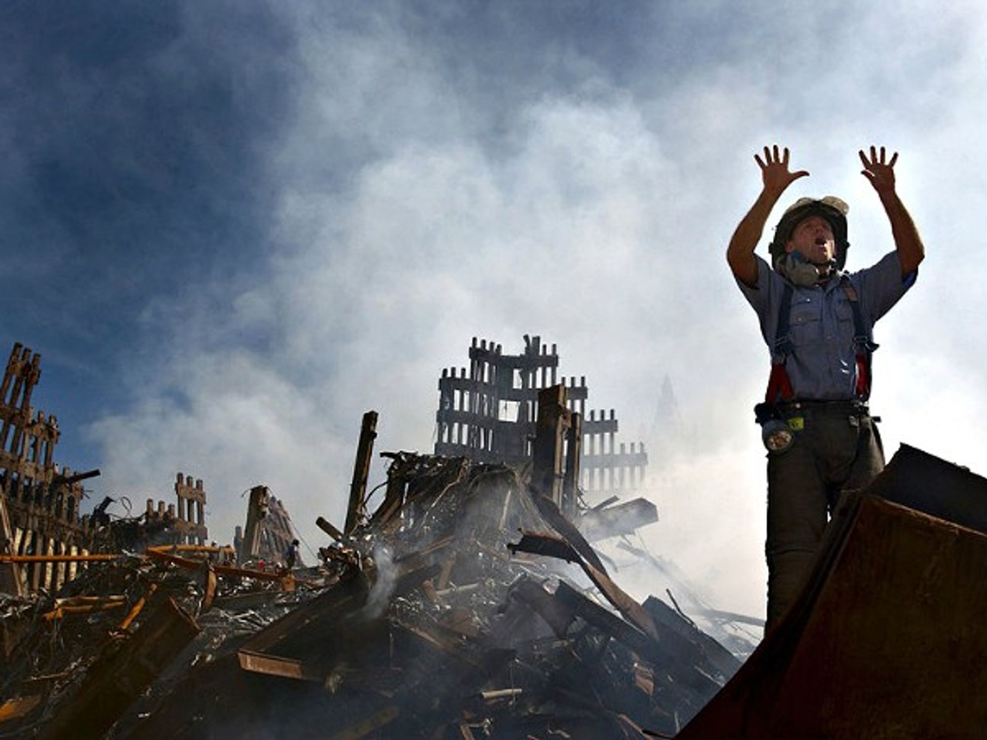 A New York City fireman calls for 10 more rescue workers to make their way into the rubble of the World Trade Center in New York city