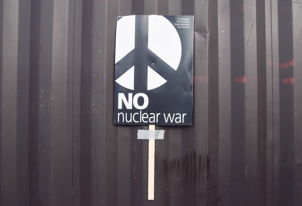 A "no nuclear war" placard.