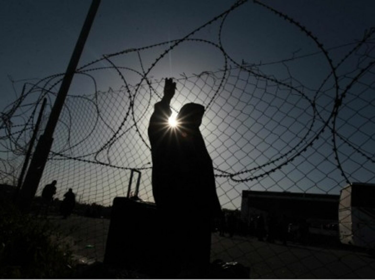 A Palestinian woman at the Rafah crossing on March 2014