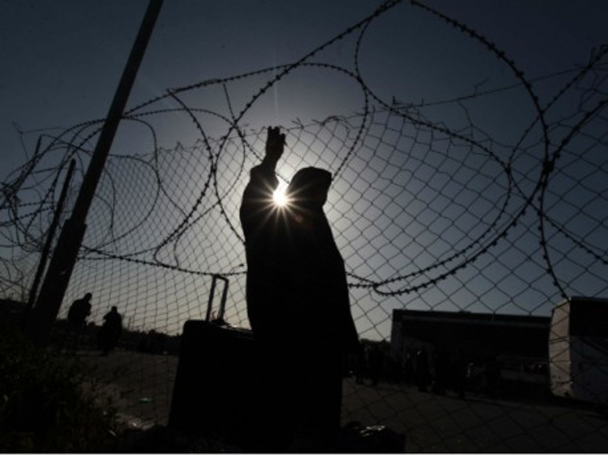 A Palestinian woman at the Rafah crossing on March 2014