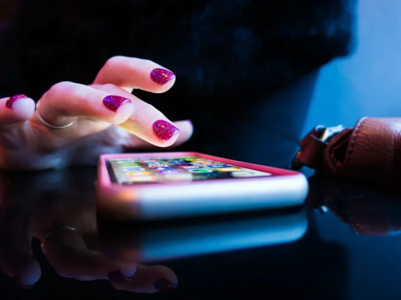 A person using a smartphone.​
