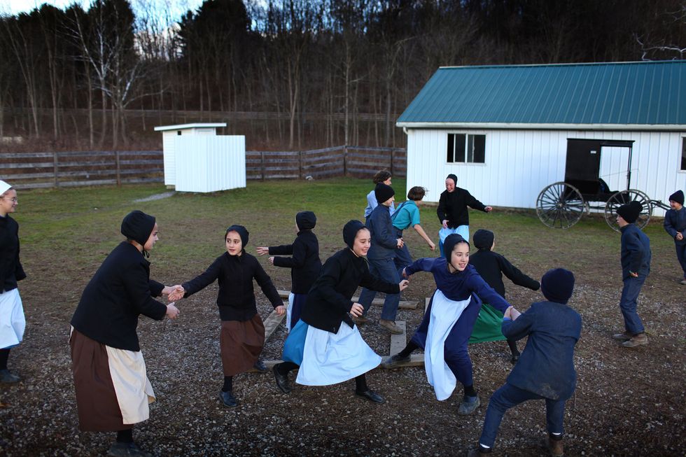 A photo of children play during a break in their school day.