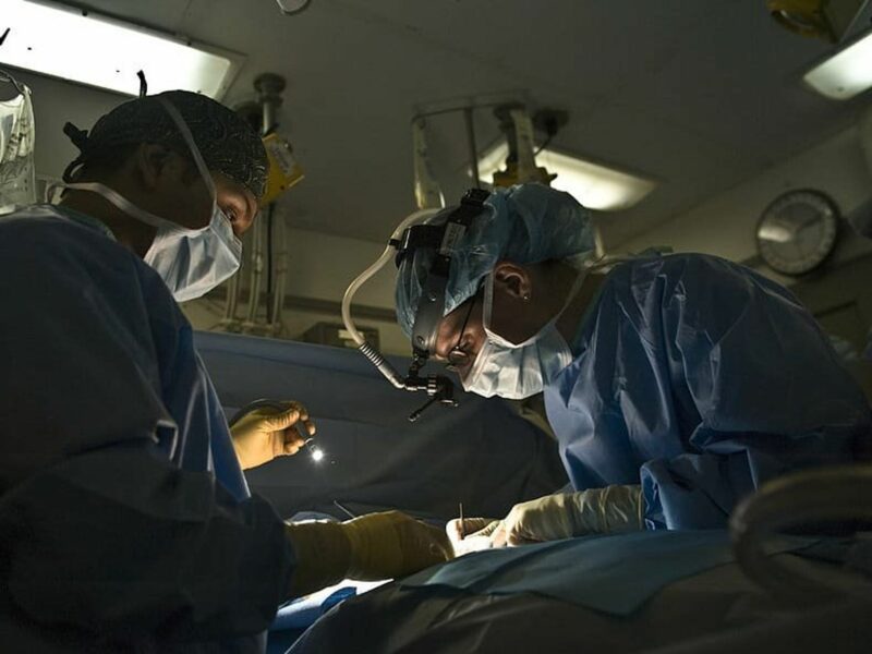 A photo of doctors performing a surgery.