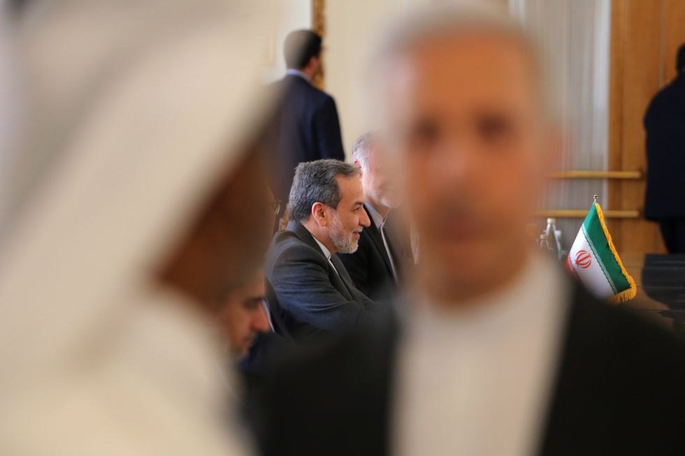 A photo of Iranian Foreign Minister Abbas Araghchi attending a meeting.