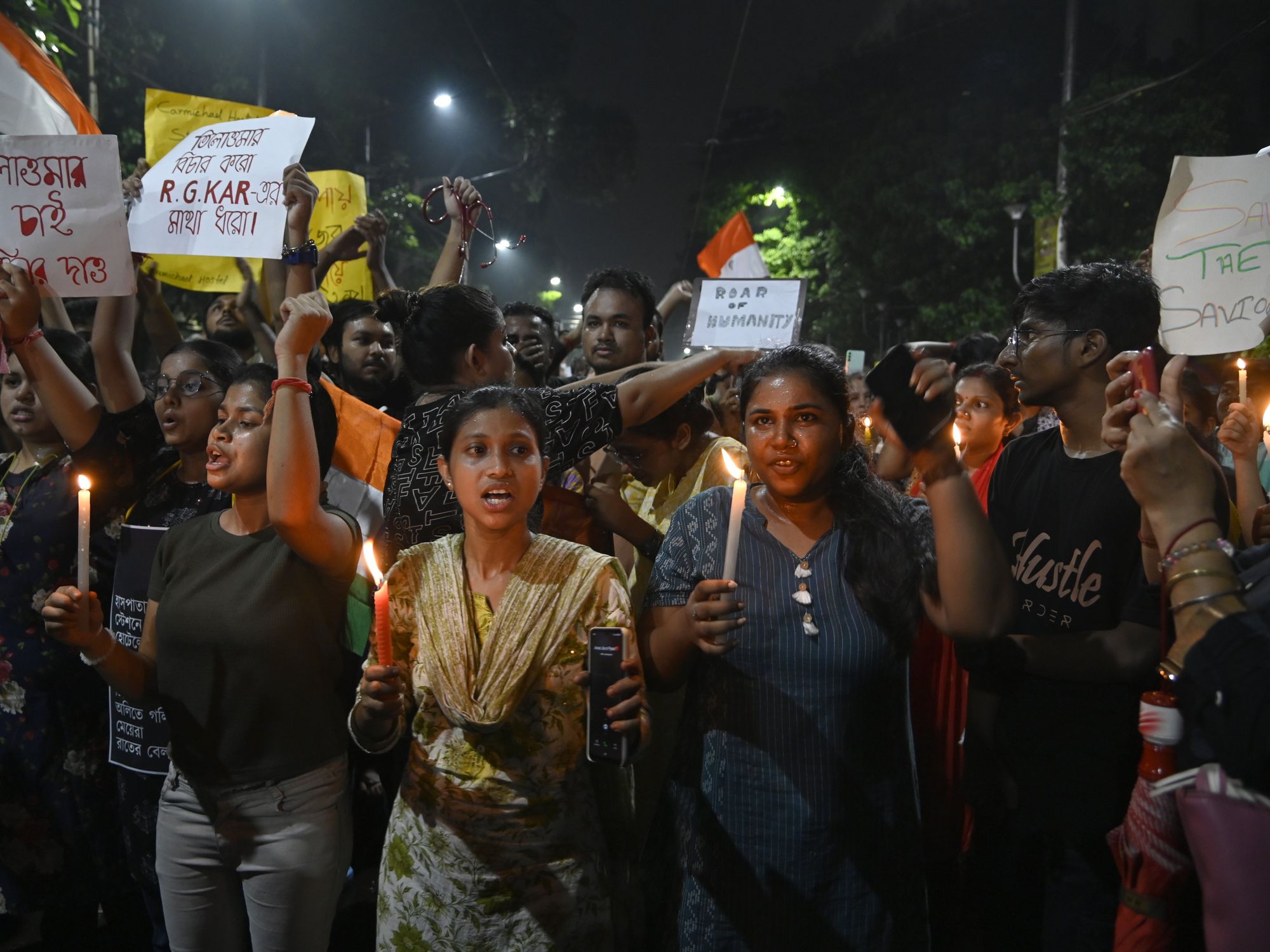 A photo of Protesters participated to a Candle Rally for demanding justice for the murder of a 31 year old post-graduate trainee in Kolkata.