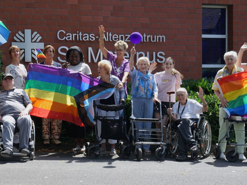 A photo of staff with Caritas retirees