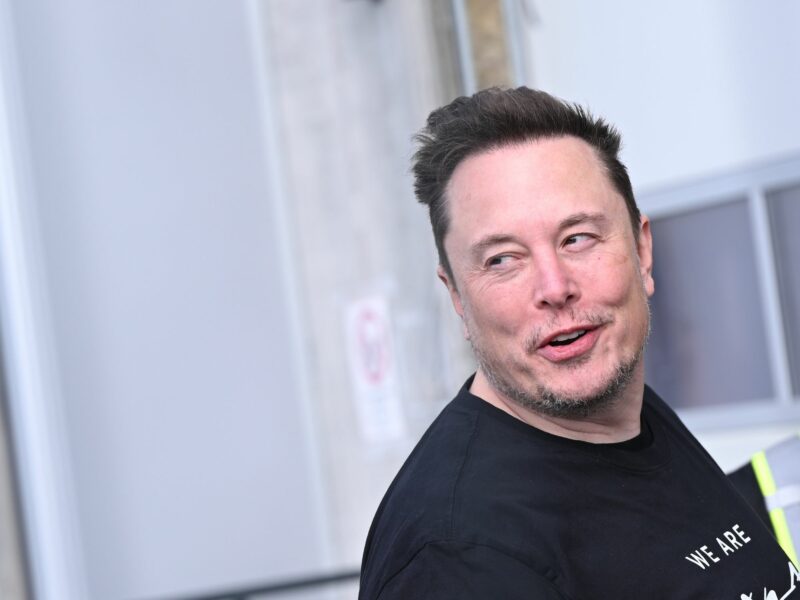 A photo of Tesla CEO Elon Musk walking through the Tesla Gigafactory in Berlin, Germany.