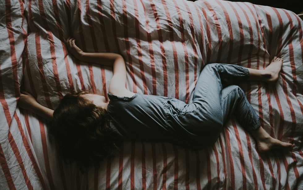 A photograph of a child sleeping.