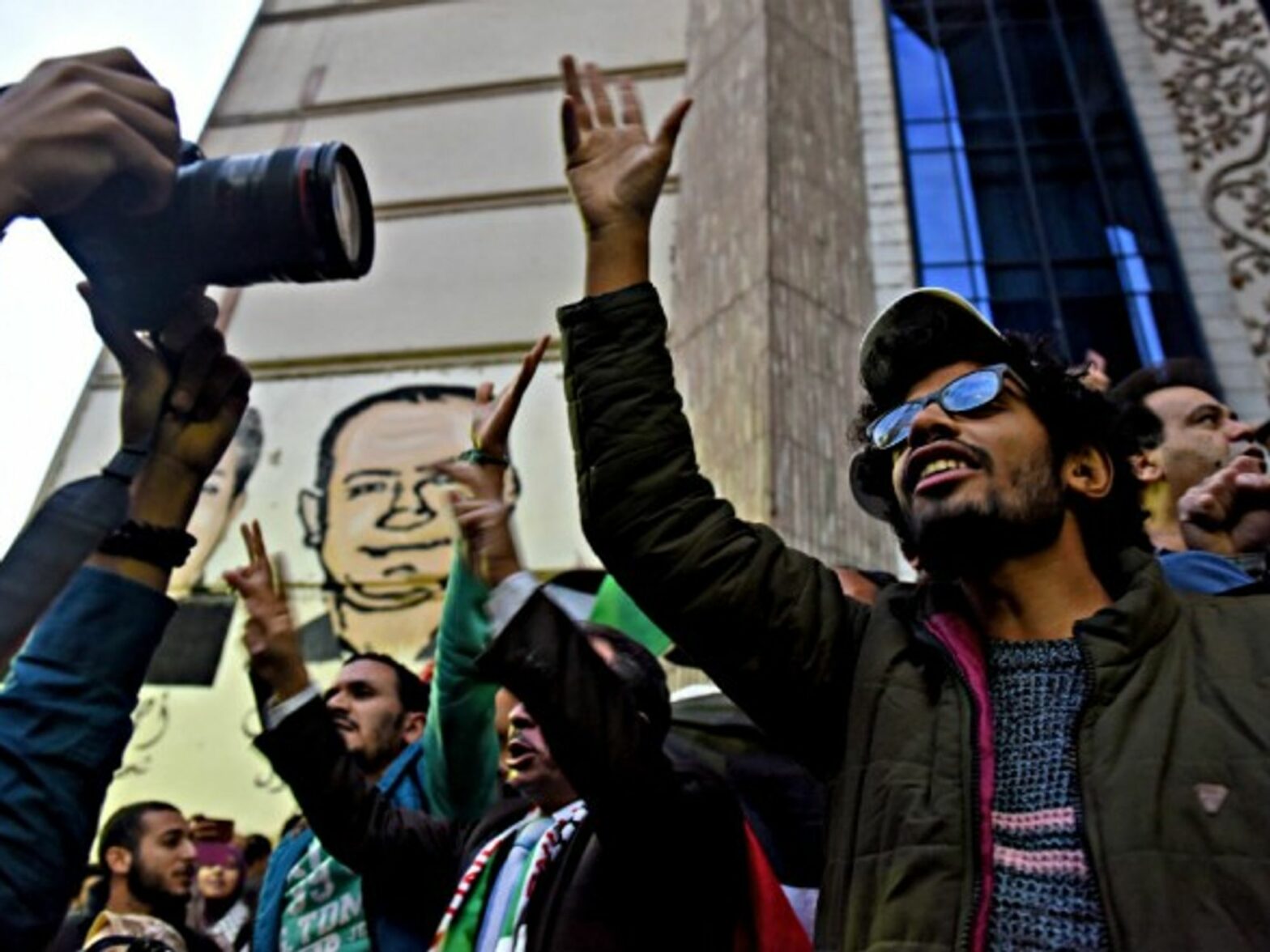 A photojournalist at work in Cairo in December