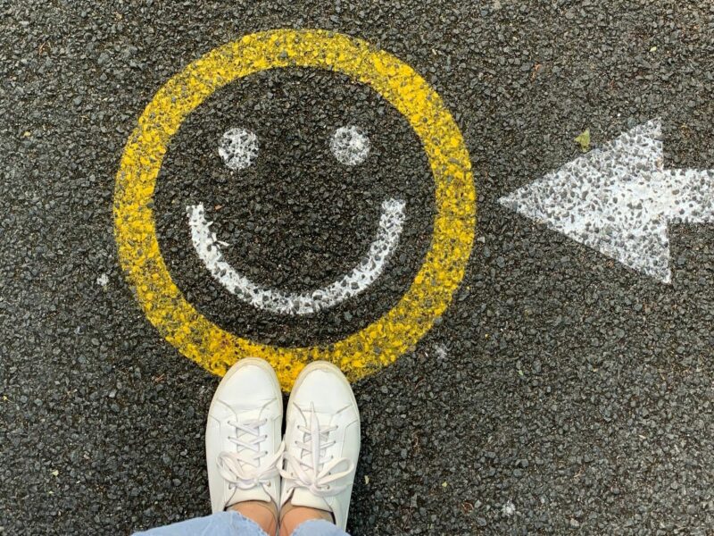 A picture of a smiley face on the ground.