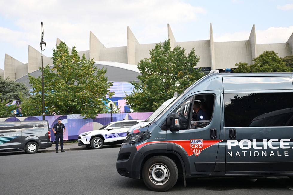 A Police Nationale vehicle is parked in front of the Parc des Princes for the Mali - Israel preliminary round, Group D, Matchday 1.