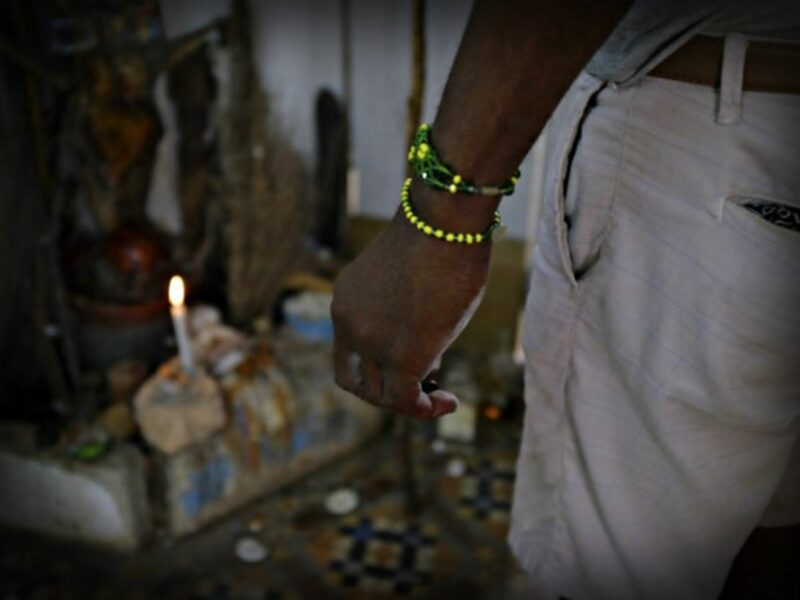 A priest performs a Santeria ceremony