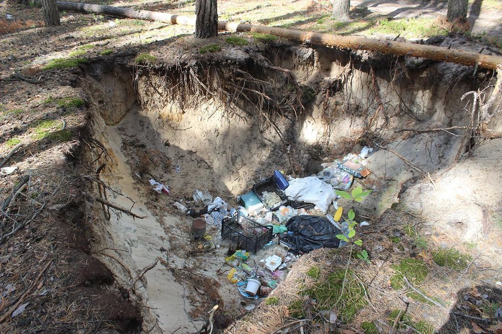 A prisoner's pit in the forest near Katyuzhanka