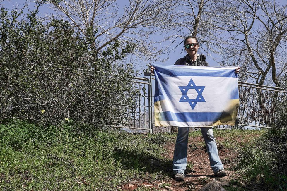 A protester outside the Israeli Parliament in Jerusalem