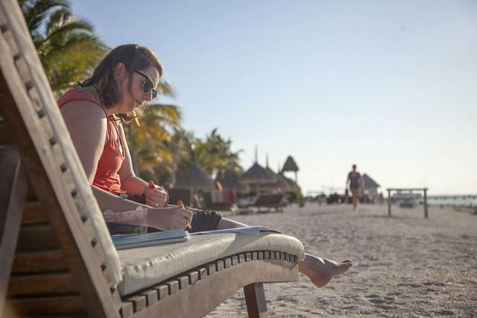 A remote worker on the beach in Mexico