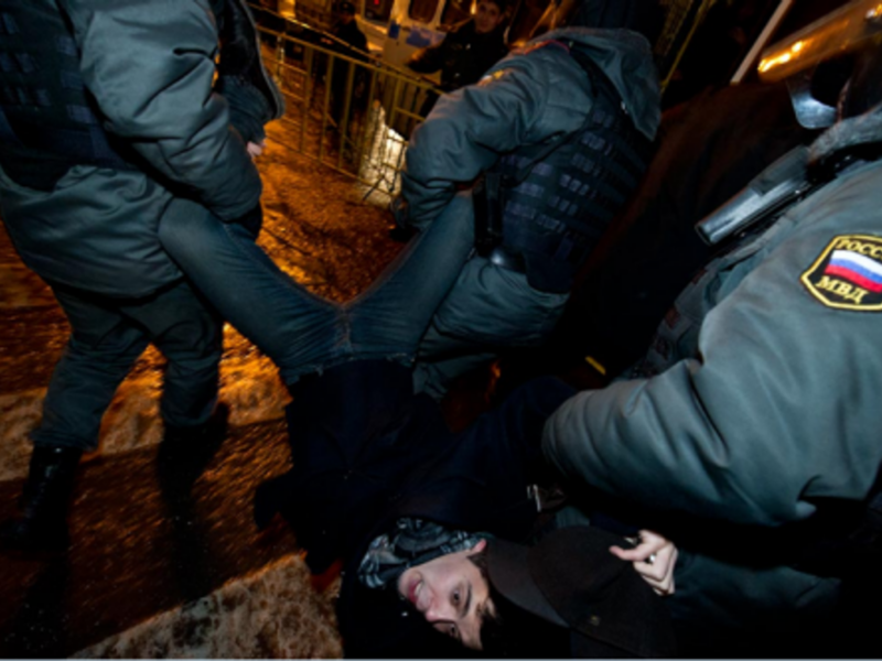 A Russia protester hauled away Sunday night (@adagamov)