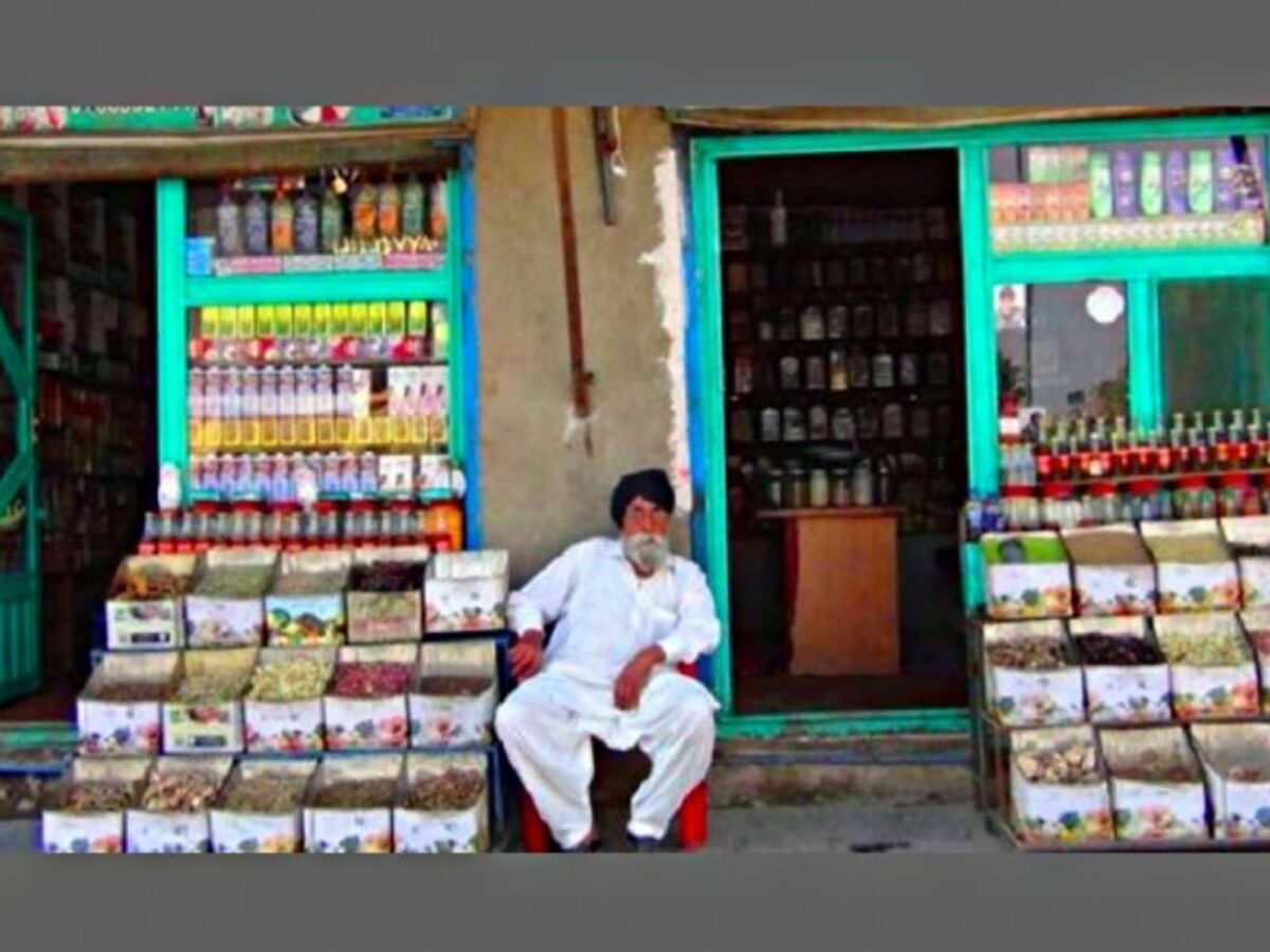 A shopkeeper selling herbal medicine in Kabul