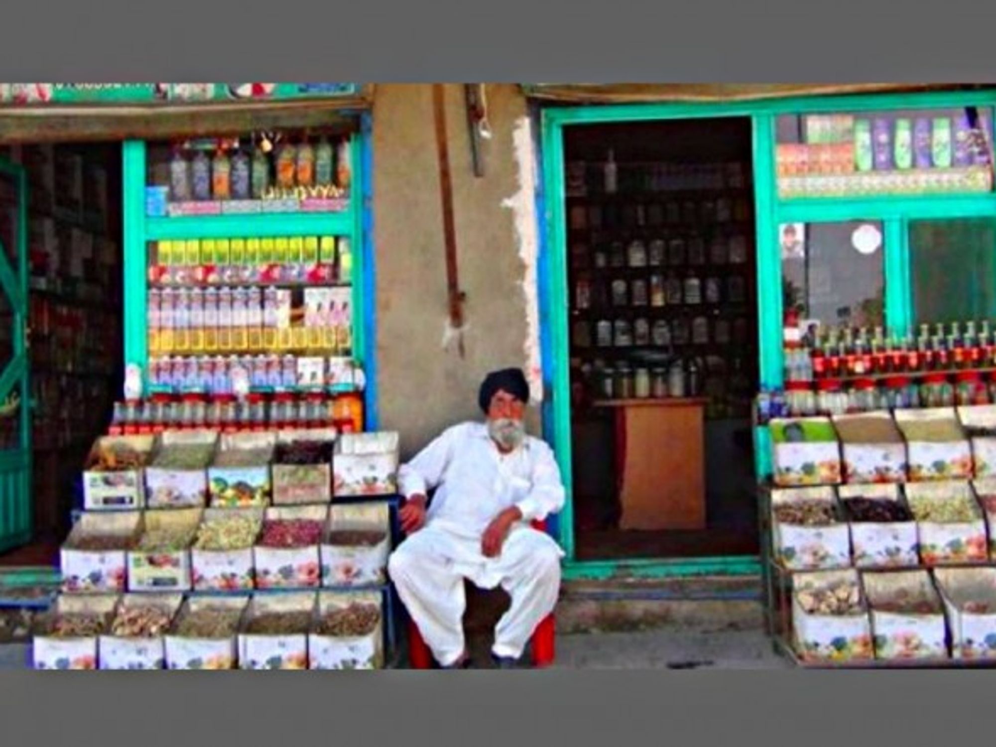 A shopkeeper selling herbal medicine in Kabul