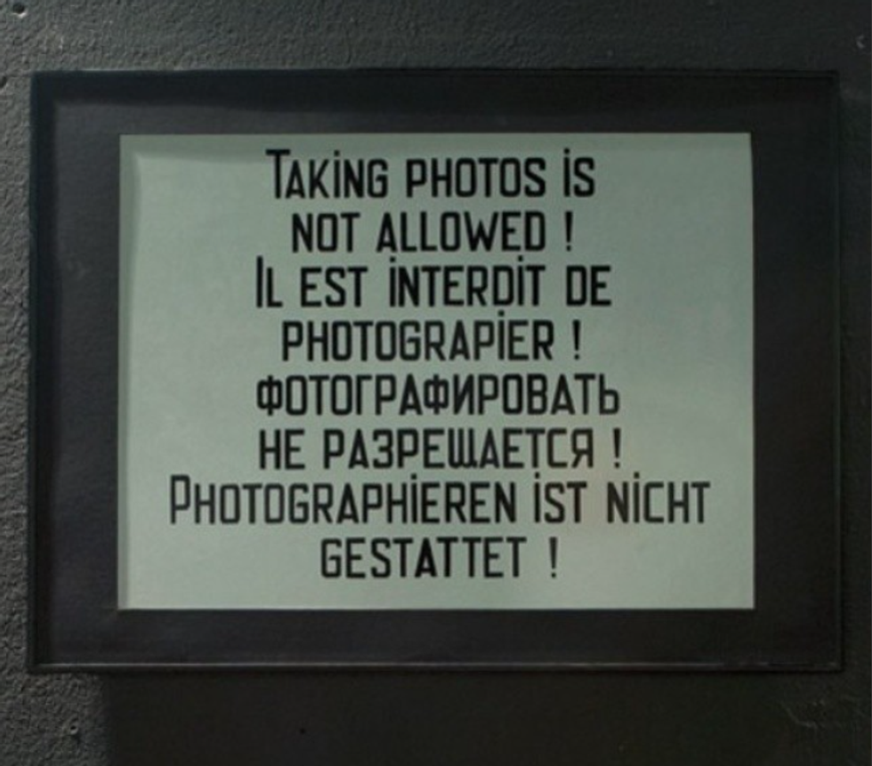 A sign at the entrance of the club, reminding party-goers that taking photos inside is not allowed.