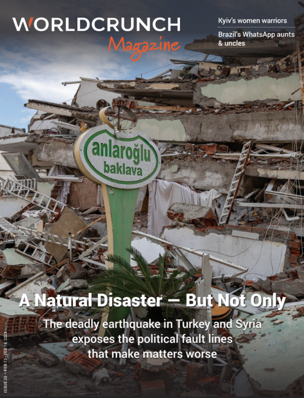 A sign that still stands in the middle of the ruins following the earthquakes, with the writing baklava a Turkish dessert