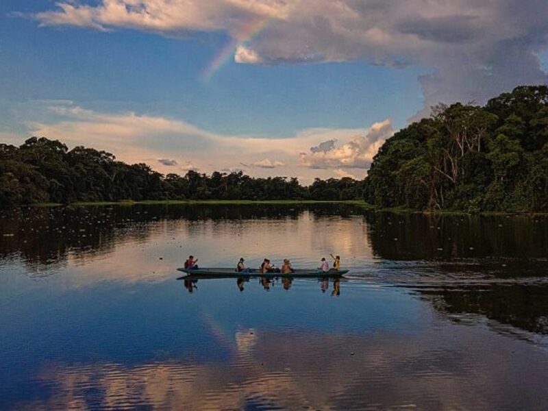 A small boat sailing on a river in Ecuador