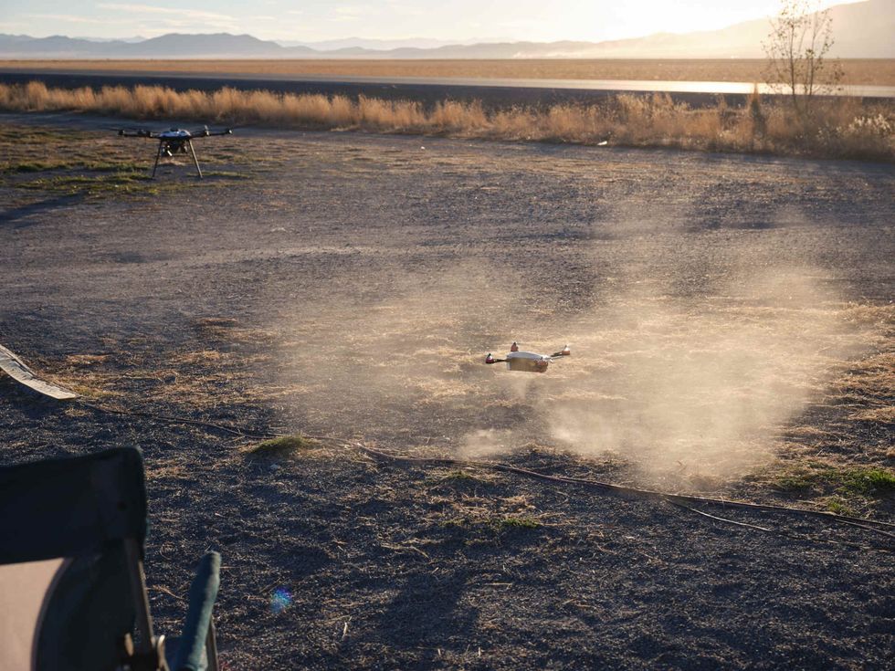 A small “enemy” drone takes off from the ground in a simulated drone attack to test DroneHunter.