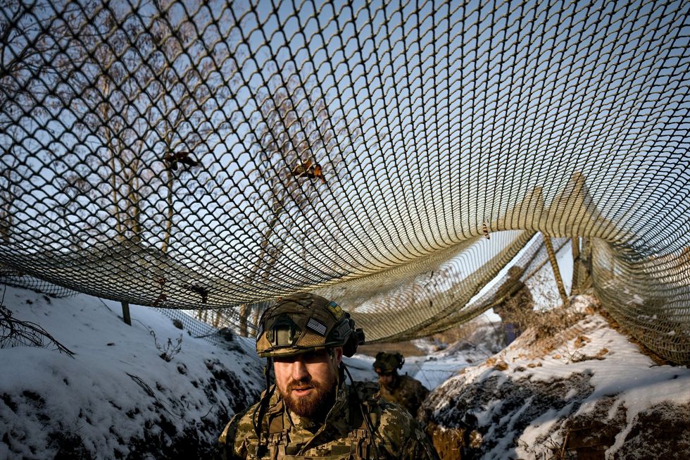 A soldier of the artillery crew of the 44th Separate Artillery Brigade named after Hetman Danylo Apostol, Zaporizhzhia region, Ukraine, on February 21, 2025.