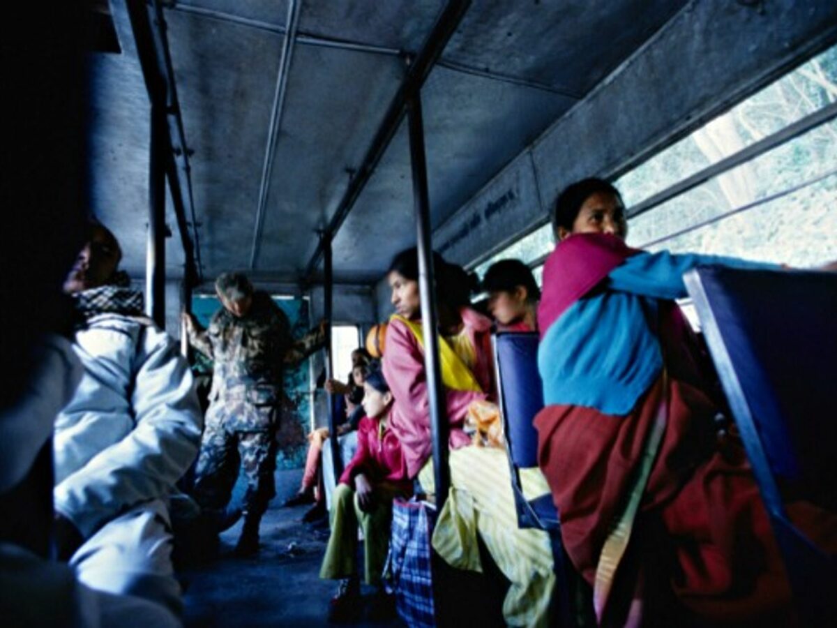 A soldier of the Nepalese army checks the luggage on board at a checking point in Kathmandu in 2005.