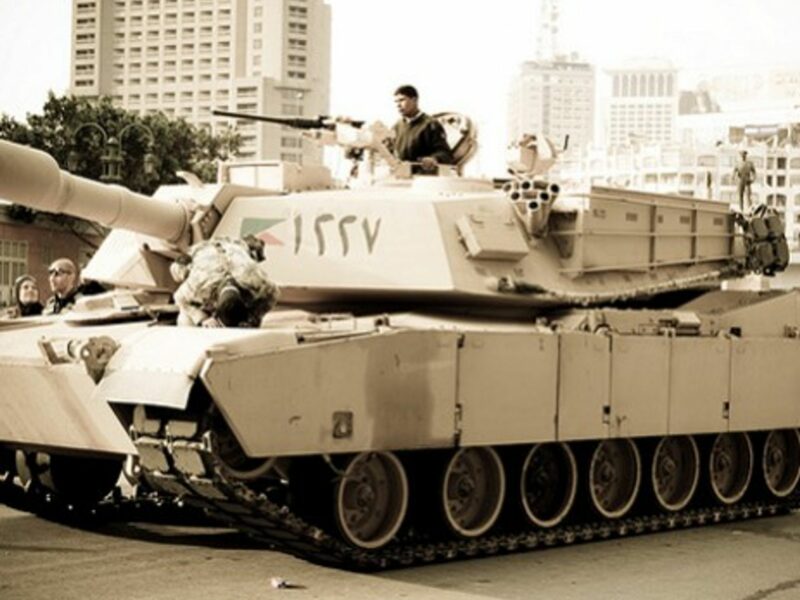 A soldier prays on a tank last month in Cairo
