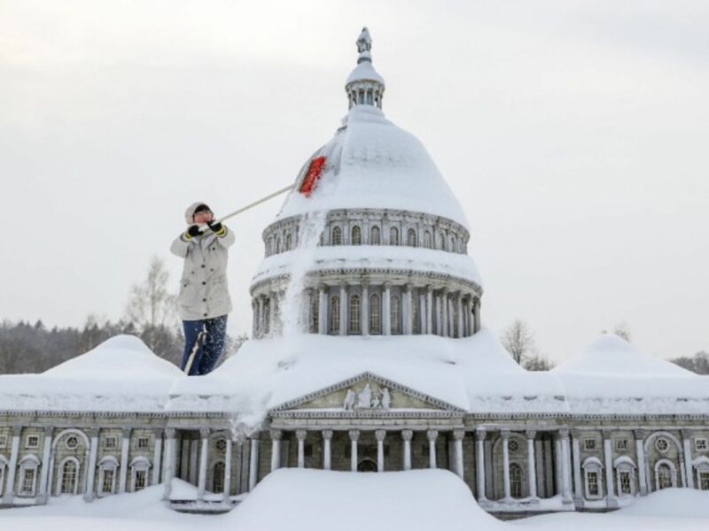 A staff member clears snow from a miniature replica of the U.S. Capitol in Miniwelt, a tourist attraction in Lichtenstein, eastern Germany.