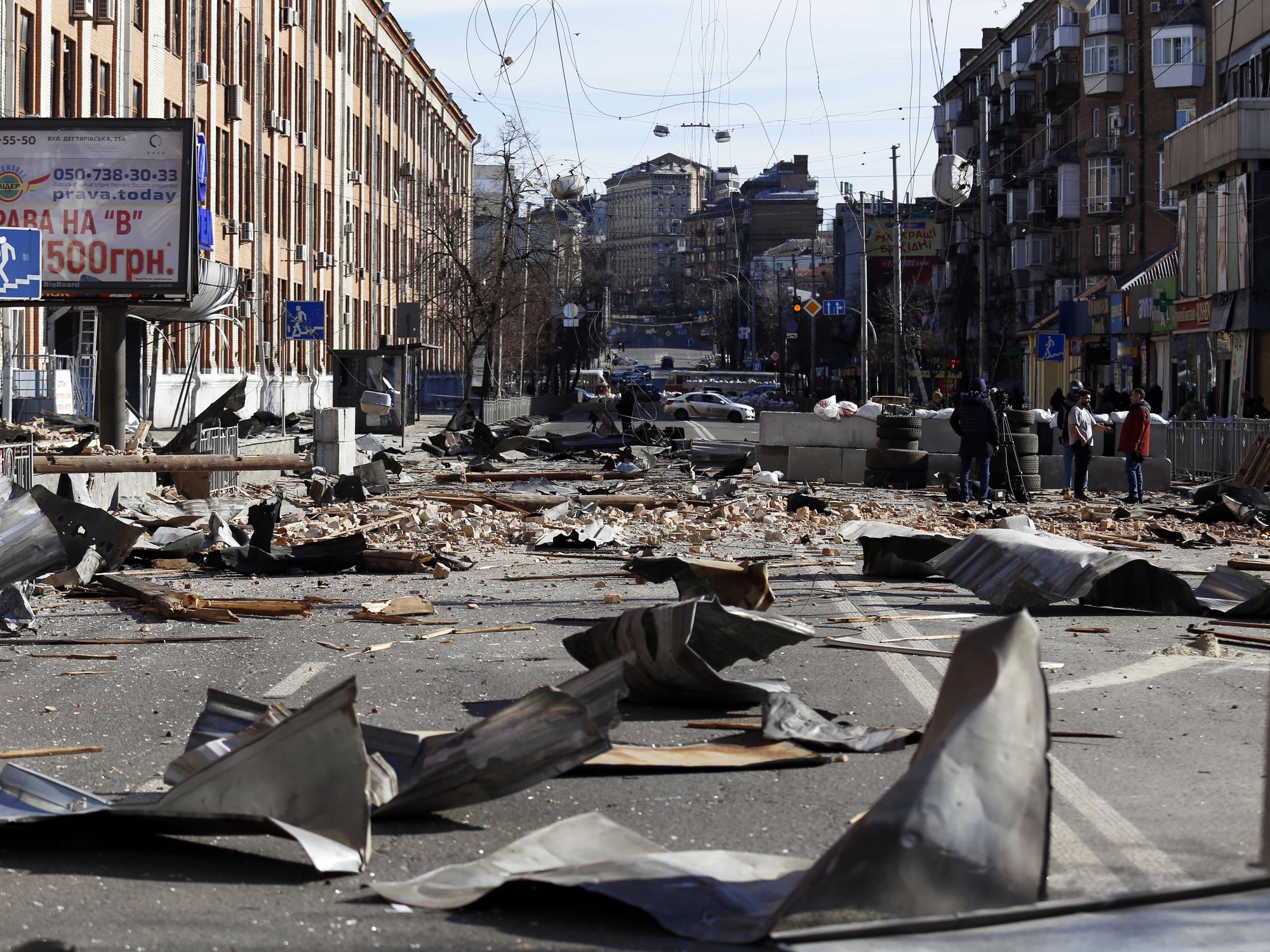 a street in Kyiv damaged by a Russian shell.