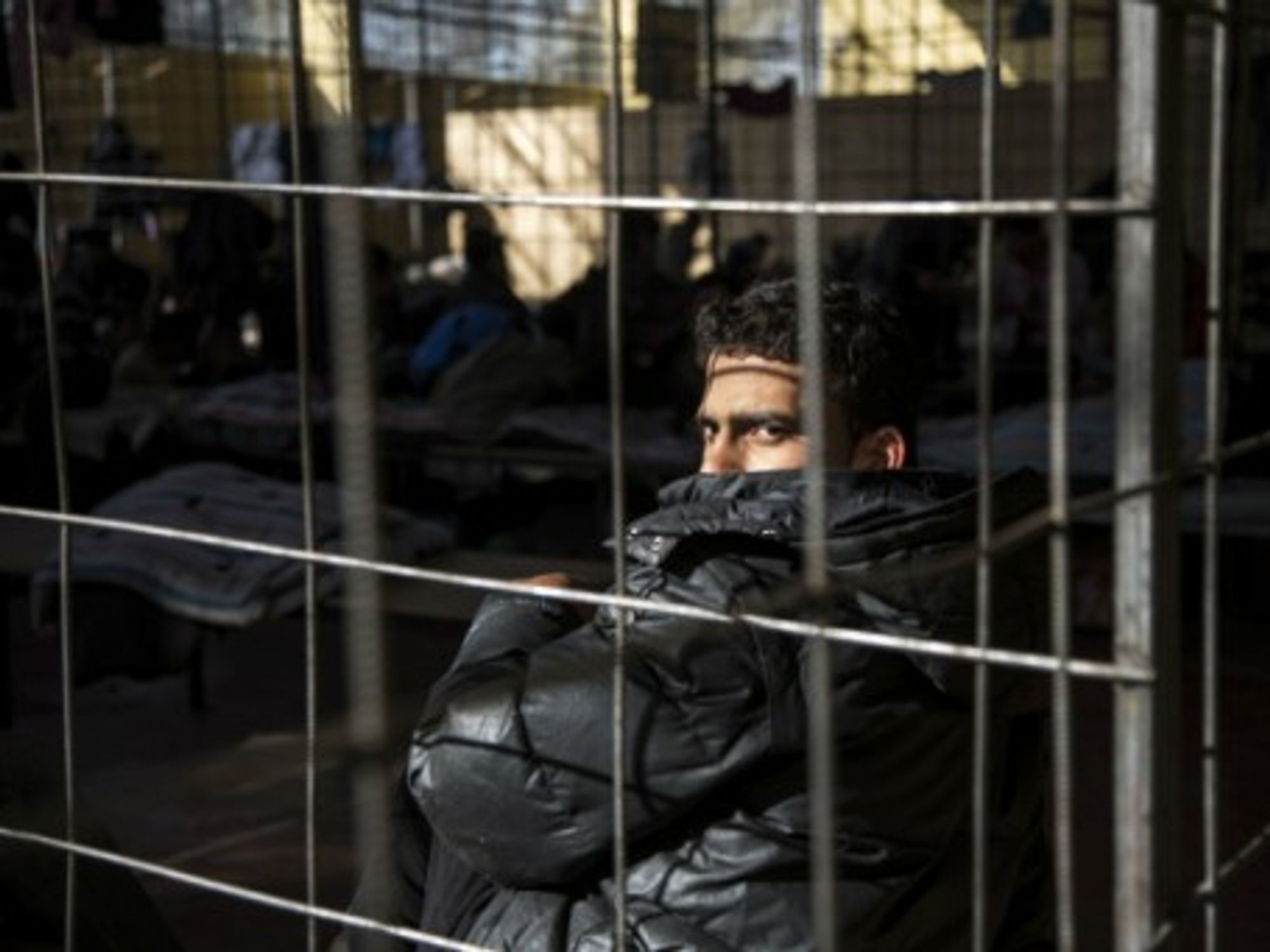 A Syrian refugee detained at a border police station in Bulgaria
