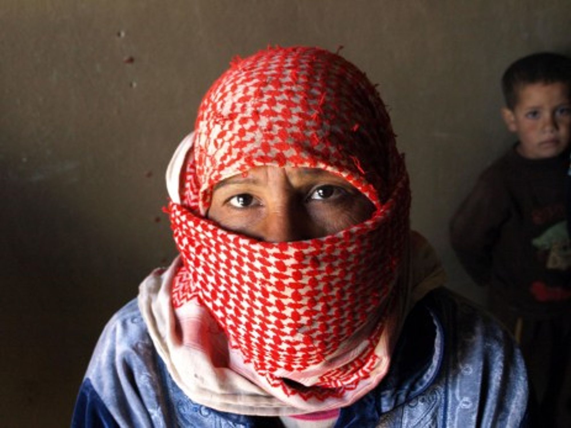 A Syrian refugee who has just crossed the border into Lebanon