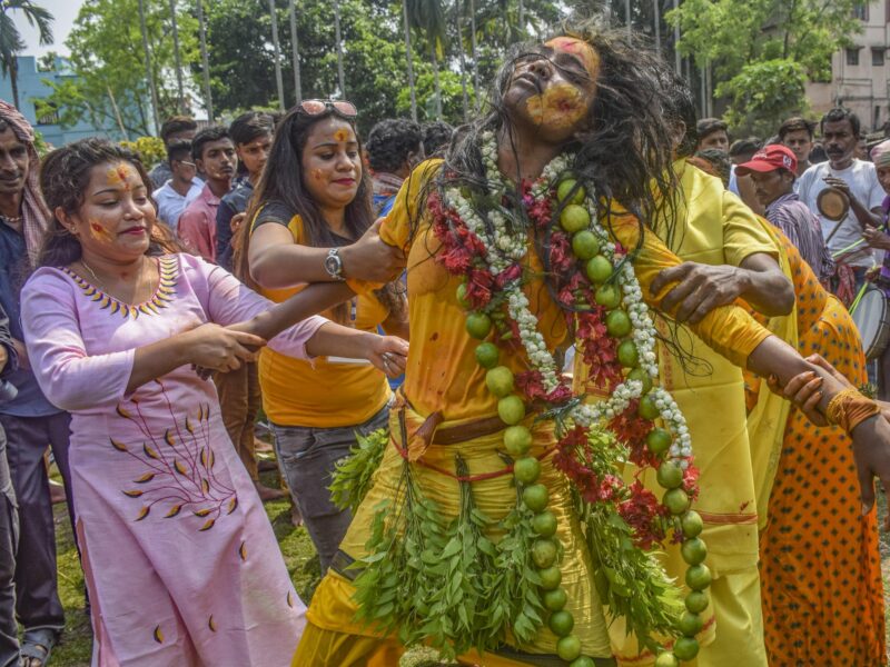 A Tamil devotee is refined with new garments and herbals goes into a trance during the 'Vel Vel' festival